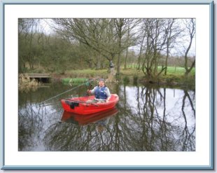 Vic dredging the pond. &copy;VG